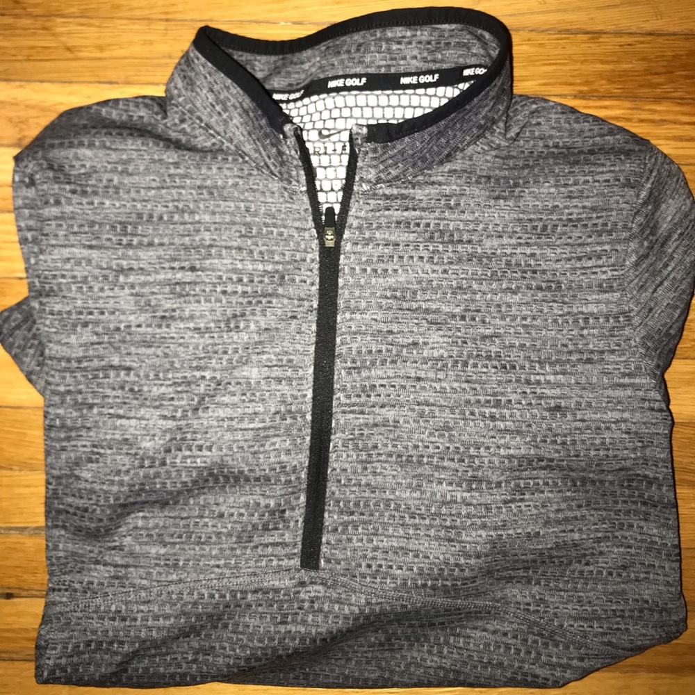 Women’s Nike Golf Quarter-zip in size Medium